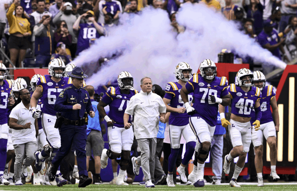 Dec 31, 2024; Houston, TX, USA; LSU Tigers head coach Brian Kelly enters the field with the team prior to the game against the Baylor Bears at NRG Stadium. Mandatory Credit: Maria Lysaker-Imagn Images