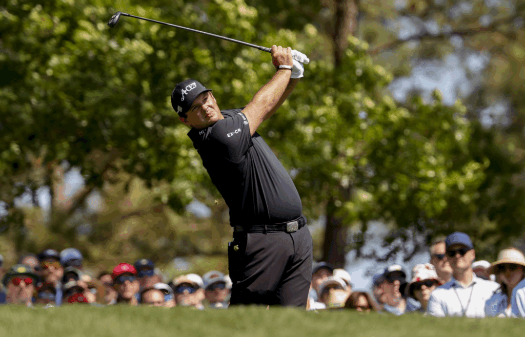 Apr 13, 2025; Augusta, Georgia, USA; Patrick Reed tees off on no. 4 during the final round of the Masters Tournament at Augusta National Golf Club. Mandatory Credit: Peter Casey-Imagn Images