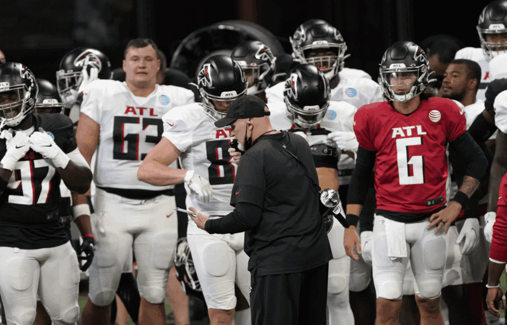Aug 28, 2020; Atlanta, Georgia, USA; Atlanta Falcons head coach Dan Quinn talks to his team during an NFL football training camp practice. Mandatory Credit: John Bazemore/Pool Photo-Imagn Images