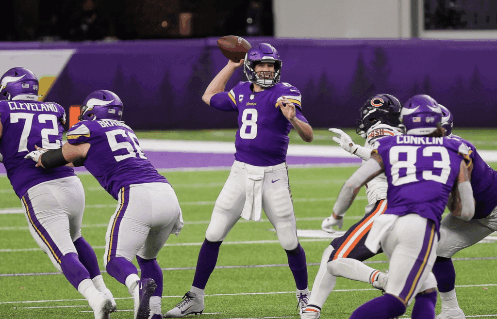 Dec 20, 2020; Minneapolis, Minnesota, USA; Minnesota Vikings quarterback Kirk Cousins (8) throws a pass in the fourth quarter against the Chicago Bears at U.S. Bank Stadium. Mandatory Credit: Brad Rempel-Imagn Images