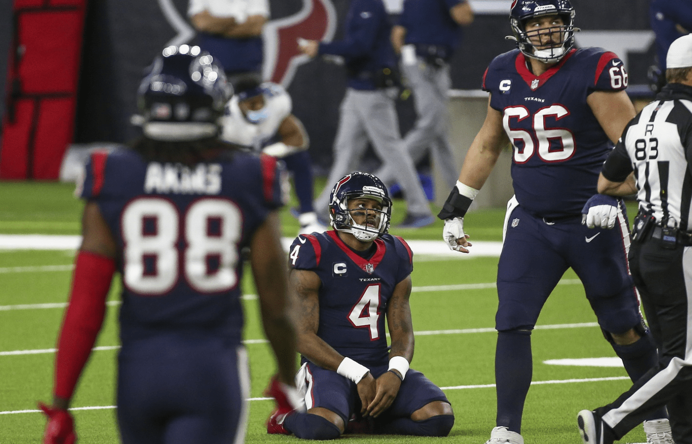 Jan 3, 2021; Houston, Texas, USA; Houston Texans quarterback Deshaun Watson (4) looks up after a play during the fourth quarter against the Tennessee Titans at NRG Stadium. Mandatory Credit: Troy Taormina-Imagn Images