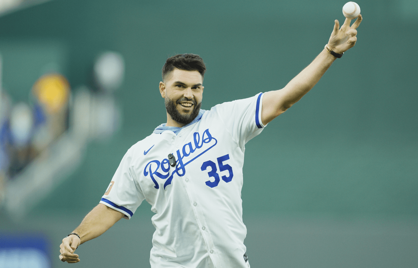 Oct 9, 2024; Kansas City, Missouri, USA; Form Kansas City Royals player Eric Hosmer throws out the cerominal first pitch before the game between the New York Yankees and the Kansas City Royals during game three of the NLDS for the 2024 MLB Playoffs at Kauffman Stadium. Mandatory Credit: Jay Biggerstaff-Imagn Images