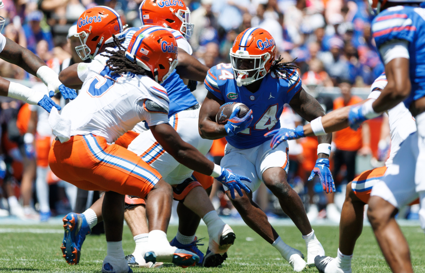Apr 12, 2025; Gainesville, FL, USA; Florida Gators running back Ja'Kobi Jackson (24) runs with the ball during the first half at Ben Hill Griffin Stadium. Mandatory Credit: Matt Pendleton-Imagn Images
