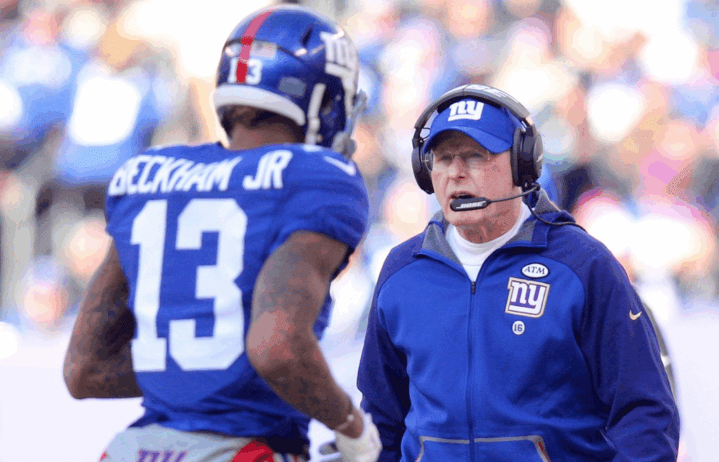 Jan 3, 2016; East Rutherford, NJ, USA; New York Giants head coach Tom Coughlin (R) talks to New York Giants wide receiver Odell Beckham Jr. (13) during the first quarter at MetLife Stadium. Mandatory Credit: Brad Penner-Imagn Images