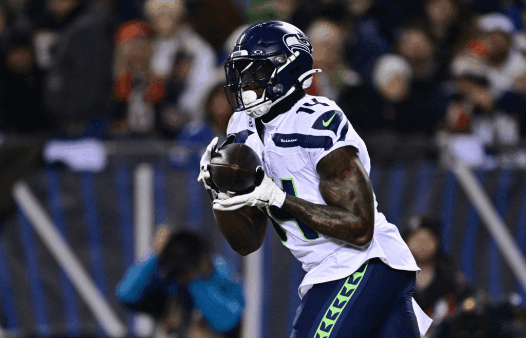 Dec 26, 2024; Chicago, Illinois, USA; Seattle Seahawks wide receiver DK Metcalf (14) makes a catch against the Chicago Bears during the first quarter at Soldier Field. Mandatory Credit: Daniel Bartel-Imagn Images