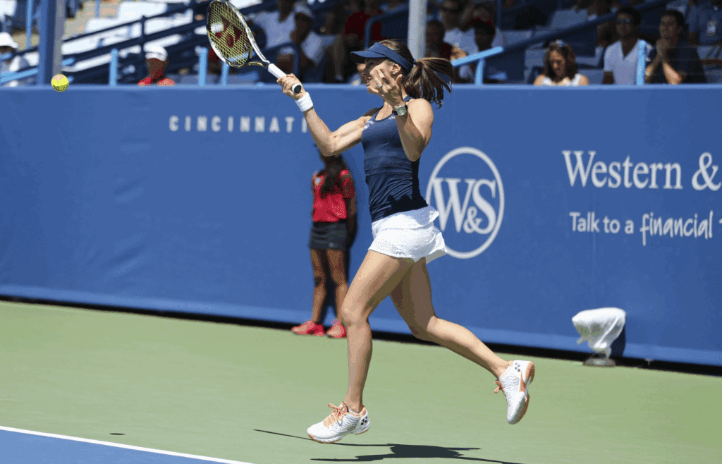 Aug 21, 2016; Mason, OH, USA; Martina Hingis (SUI) returns a shot against Sania Mirza (IND) and Barbora Strycova (CZE) in the doubles final during the Western and Southern tennis tournament at Linder Family Tennis Center. Mandatory Credit: Aaron Doster-Imagn Images, TopPic