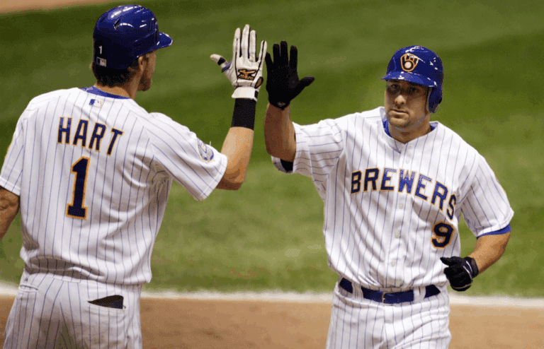 June 22, 2007; Milwaukee, WI, USA; Milwaukee Brewers second baseman Tony Graffanino (9) is congratulated by right fielder Corey Hart (1) after hitting a home run during the sixth inning against the Kansas City Royals at Miller Park. Mandatory Credit: Photo By Jeff Hanisch-Imagn Images Copyright (c) 2007 Jeff Hanisch