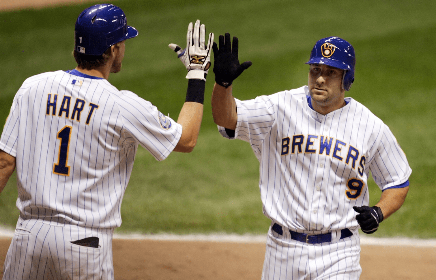 June 22, 2007; Milwaukee, WI, USA; Milwaukee Brewers second baseman Tony Graffanino (9) is congratulated by right fielder Corey Hart (1) after hitting a home run during the sixth inning against the Kansas City Royals at Miller Park. Mandatory Credit: Photo By Jeff Hanisch-Imagn Images Copyright (c) 2007 Jeff Hanisch