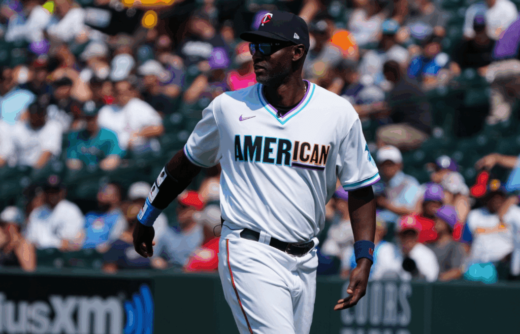 Jul 11, 2021; Denver, CO, USA; American League manager Latroy Hawkins leaves the mound in the fifth inning against the National League of the 2021 MLB All Star Futures Game at Coors Field. Mandatory Credit: Ron Chenoy-Imagn Images