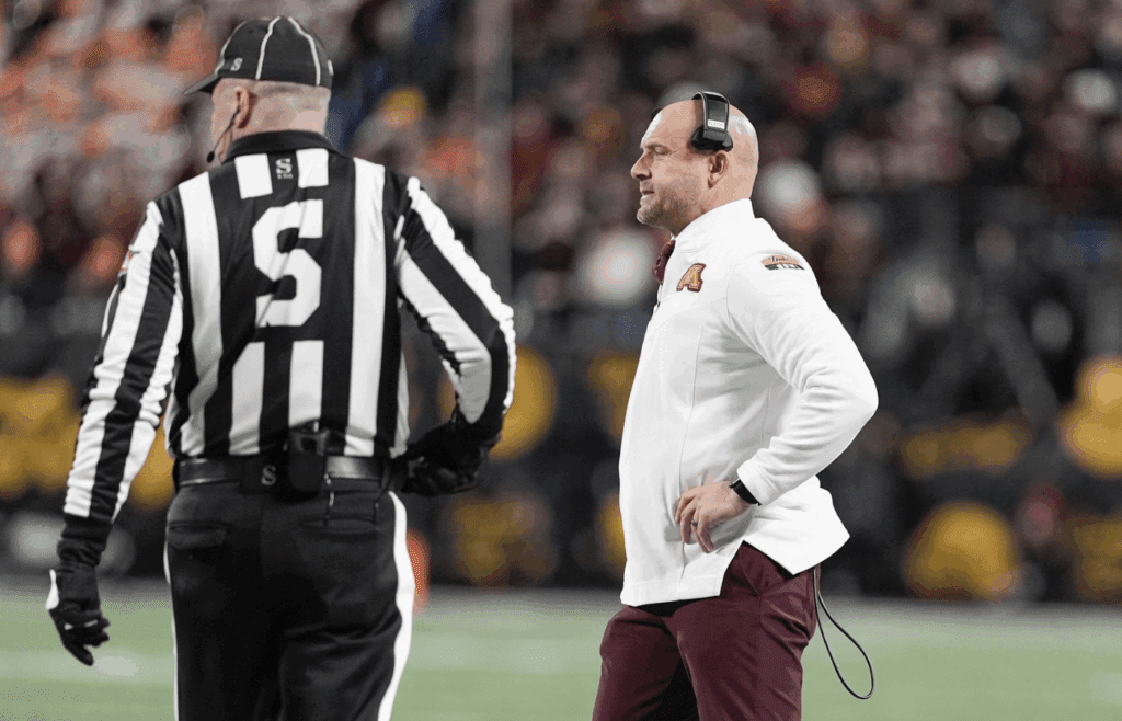 Jan 3, 2025; Charlotte, NC, USA; Minnesota Golden Gophers head coach P.J. Fleck during the first quarter against the Virginia Tech Hokies at the Dukes’ Mayo Bowl at Bank of America Stadium. Mandatory Credit: Jim Dedmon-Imagn Images
