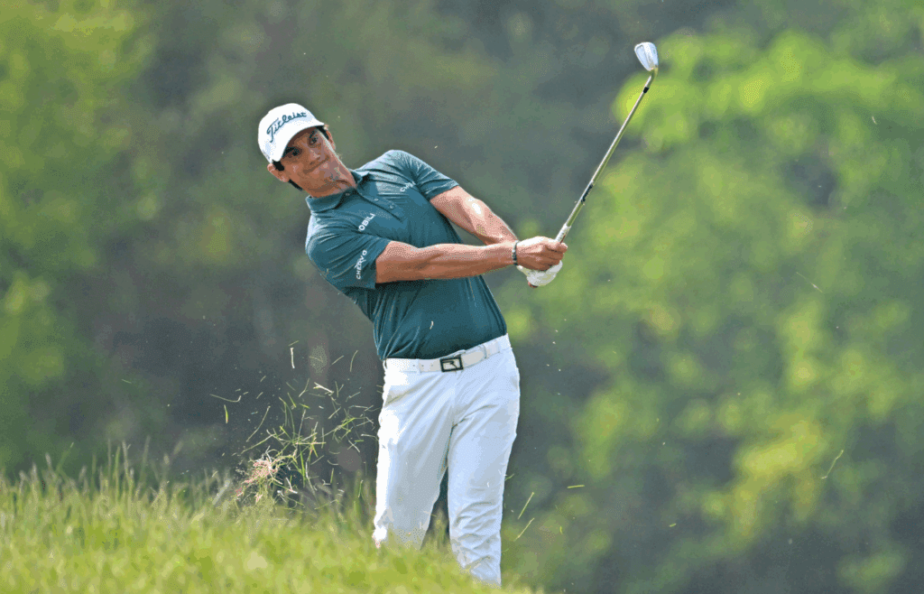 Jun 7, 2025; Caledon, Ontario, CAN; Matteo Manassero hits a shot from the rough on the 18th hole during the third round of the RBC Canadian Open golf tournament. Mandatory Credit: Dan Hamilton-Imagn Images