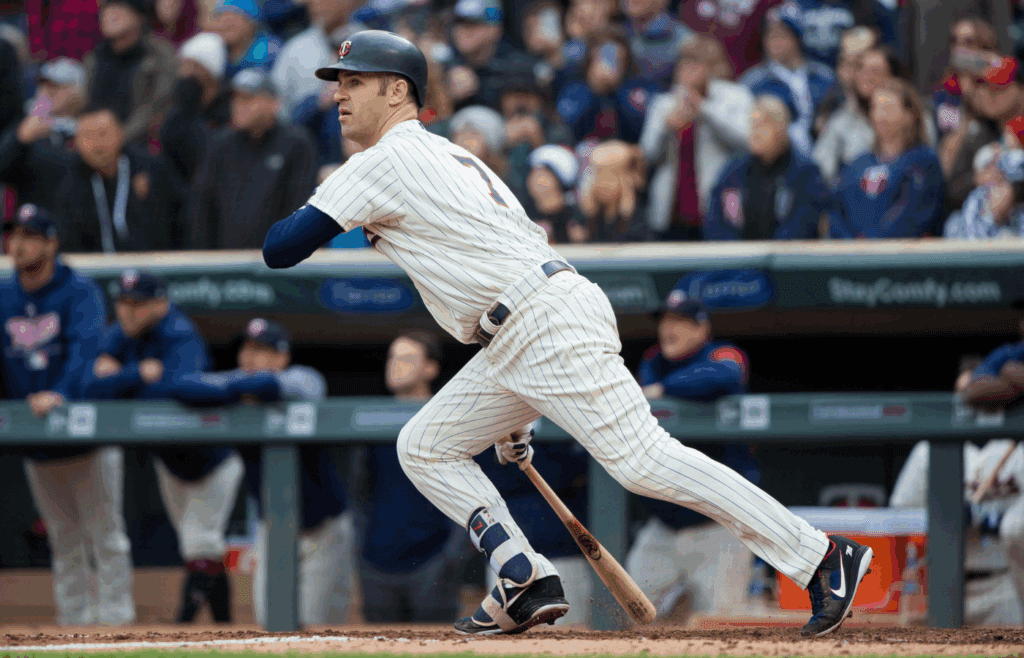 Sep 30, 2018; Minneapolis, MN, USA; Minnesota Twins first baseman Joe Mauer (7) doubles in the seventh inning against Chicago White Sox at Target Field. Mandatory Credit: Brad Rempel-Imagn Images