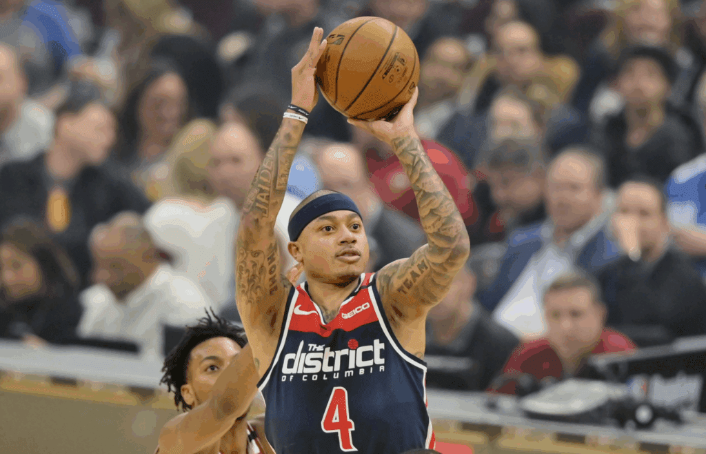 Jan 23, 2020; Cleveland, Ohio, USA; Washington Wizards guard Isaiah Thomas (4) shoots against the Cleveland Cavaliers in the first quarter at Rocket Mortgage FieldHouse. Mandatory Credit: David Richard-Imagn Images