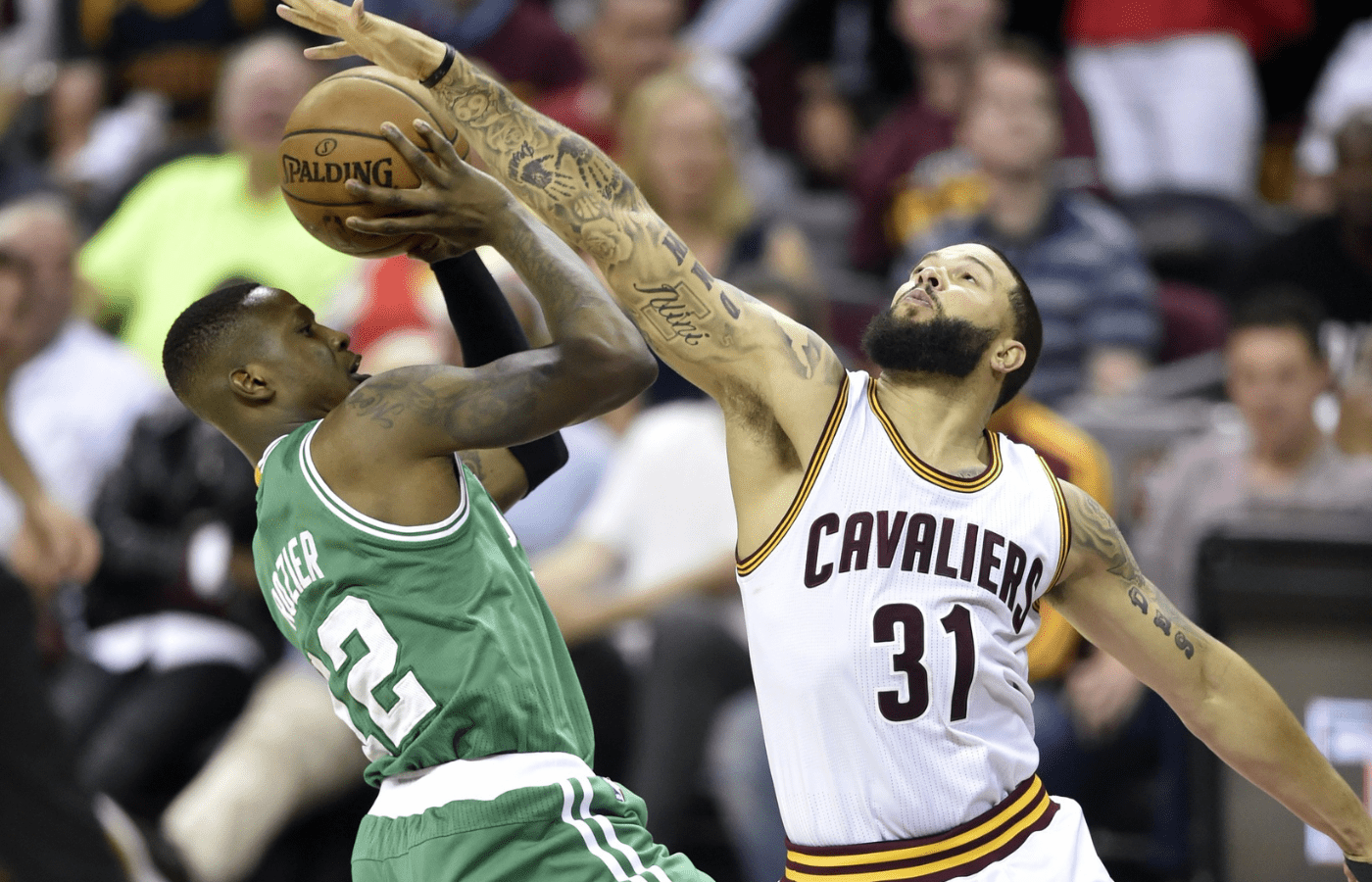 May 23, 2017; Cleveland, OH, USA; Cleveland Cavaliers guard Deron Williams (31) defends Boston Celtics guard Terry Rozier (12) in the third quarter in game four of the Eastern conference finals of the NBA Playoffs at Quicken Loans Arena. Mandatory Credit: David Richard-Imagn Images