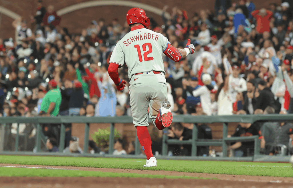 Jul 8, 2025; San Francisco, California, USA; Philadelphia Phillies designated hitter Kyle Schwarber (12) gestures towards fans as he rounds the bases on a two-run home run to bat in pinch hitter Brandon Marsh (16) against the San Francisco Giants during the seventh inning at Oracle Park. Mandatory Credit: Kelley L Cox-Imagn Images