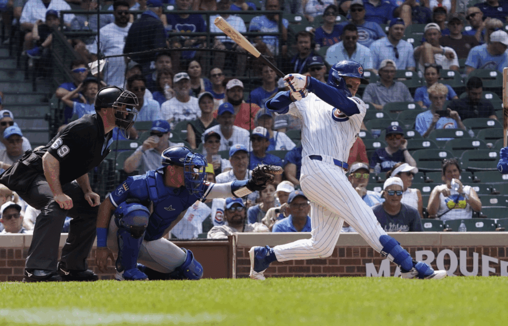 Jul 23, 2025; Chicago, Illinois, USA; Chicago Cubs outfielder Pete Crow-Armstrong (4) hits a home run against the Kansas City Royals during the eighth inning at Wrigley Field. Mandatory Credit: David Banks-Imagn Images