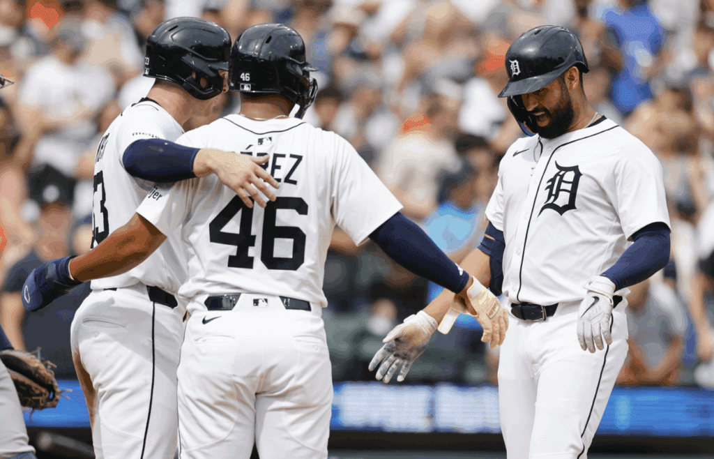 Jul 12, 2025; Detroit, Michigan, USA; Detroit Tigers second baseman Colt Keith (33) and outfielder Wenceel Pérez (46) celebrate with left fielder Riley Greene (31) after Greene hit a three run home run in the fifth inning against the Seattle Mariners at Comerica Park. Mandatory Credit: Rick Osentoski-Imagn Images
