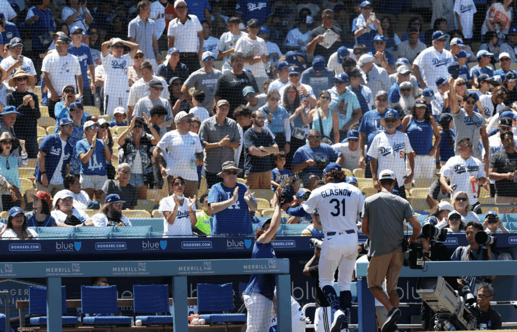 Jul 23, 2025; Los Angeles, California, USA; Los Angeles Dodgers starting pitcher Tyler Glasnow (31) receives standing ovation from fans after pitching seventh inning against the Minnesota Twins at Dodger Stadium. Mandatory Credit: Kiyoshi Mio-Imagn Images