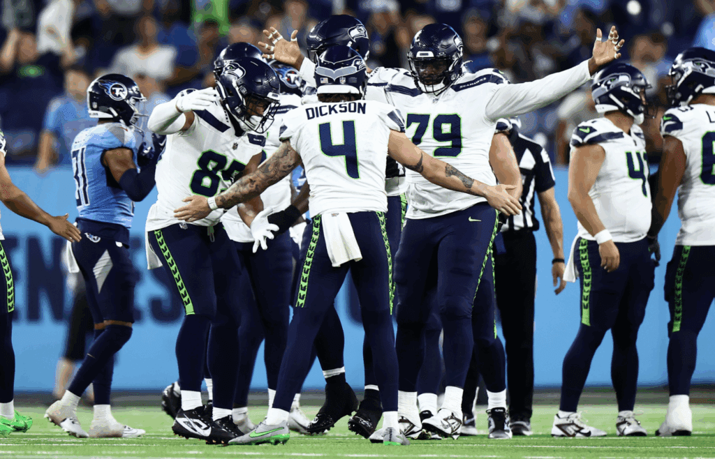 Aug 17, 2024; Nashville, Tennessee, USA; Seattle Seahawks team celebrates a field goal to take a 15-13 lead late in the game against the Tennessee Titans at Nissan Stadium. Mandatory Credit: Casey Gower-Imagn Images
