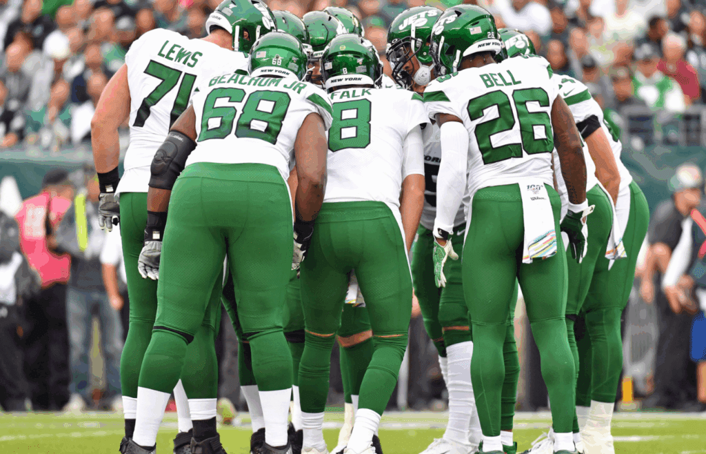 Oct 6, 2019; Philadelphia, PA, USA; New York Jets quarterback Luke Falk (8) leads his team in the huddle against the Philadelphia Eagles at Lincoln Financial Field. Mandatory Credit: Eric Hartline-Imagn Images
