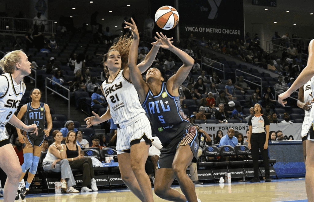 Jul 16, 2025; Chicago, Illinois, USA; Chicago Sky forward Maddy Westbeld (21) and Atlanta Dream forward Taylor Thierry (5) chase a rebound during the second half at Wintrust Arena. Mandatory Credit: Matt Marton-Imagn Images