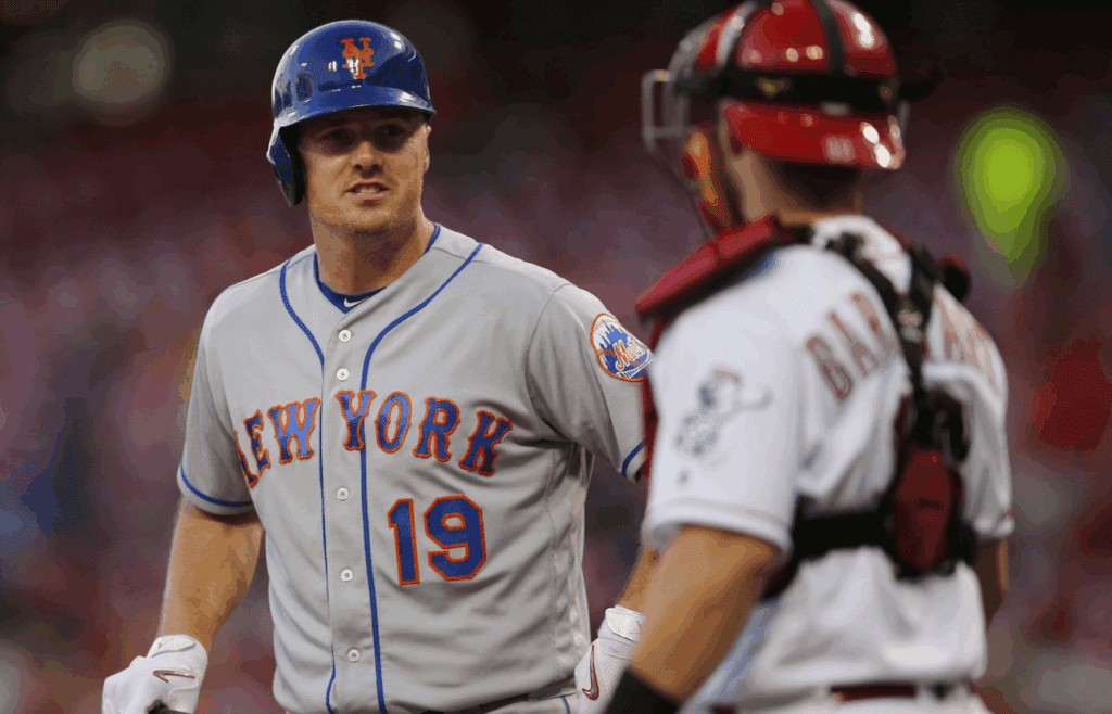 New York Mets right fielder Jay Bruce (19) talks to Cincinnati Reds catcher Tucker Barnhart (16) in the second inning during the MLB National League baseball game between the New York Mets and the Cincinnati Reds, Tuesday, Sept. 6, 2016, at Great American Ball Park in Cincinnati