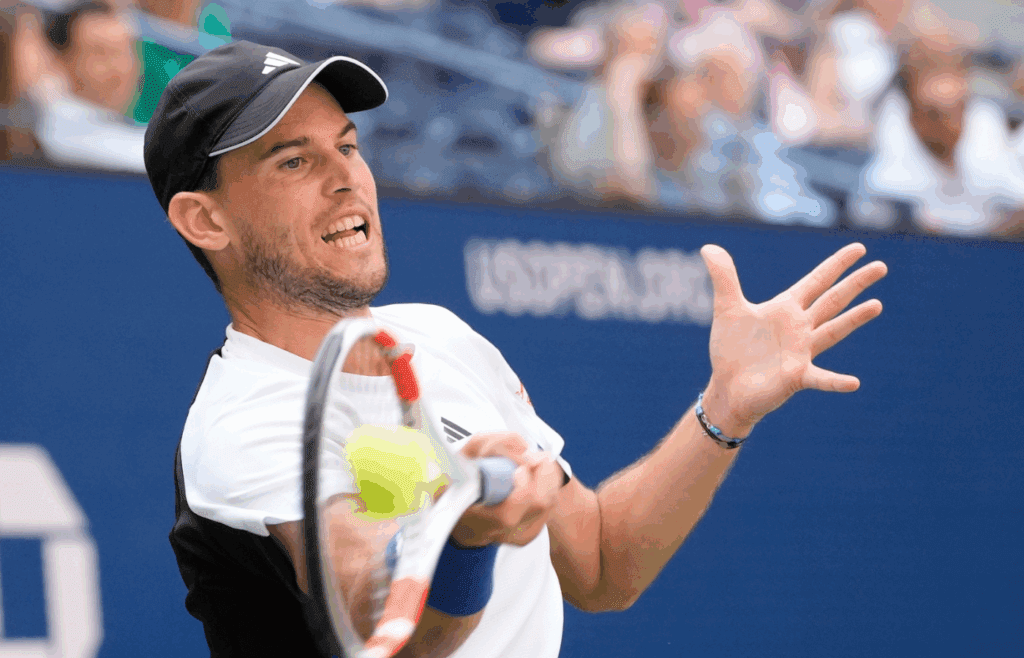 Aug 26, 2024; Flushing, NY, USA; Dominic Thiem of Austria hits to Ben Shelton of the USA on day one of the 2024 U.S. Open tennis tournament at USTA Billie Jean King National Tennis Center. Mandatory Credit: Robert Deutsch-Imagn Images
