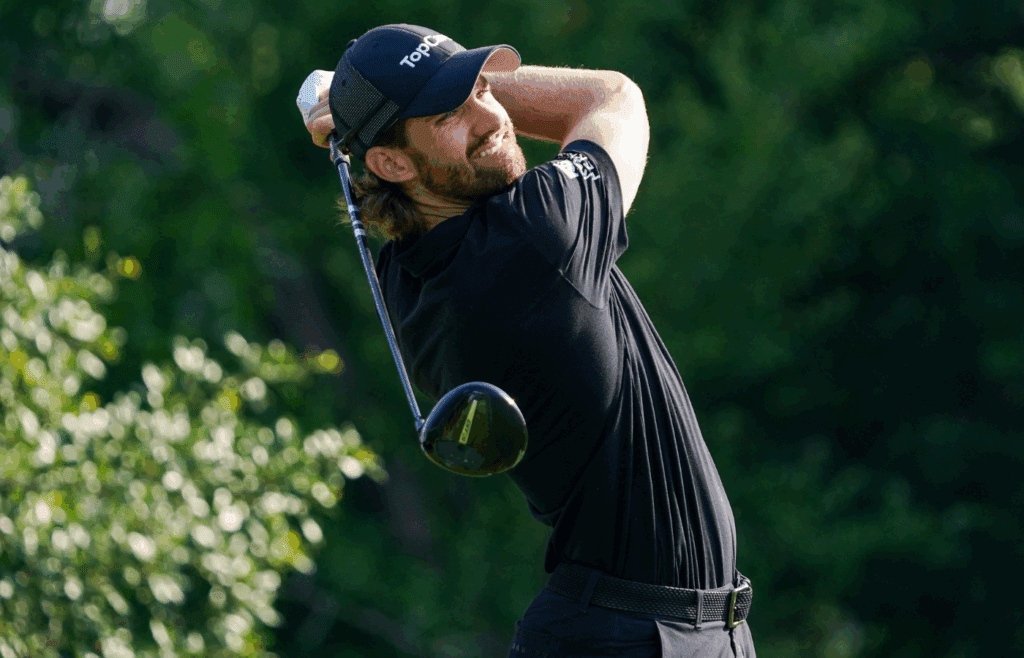May 22, 2025; Fort Worth, Texas, USA; Patrick Rodgers plays his shot from the ninth tee during the first round of the Charles Schwab Challenge golf tournament. Mandatory Credit: Raymond Carlin III-Imagn Images