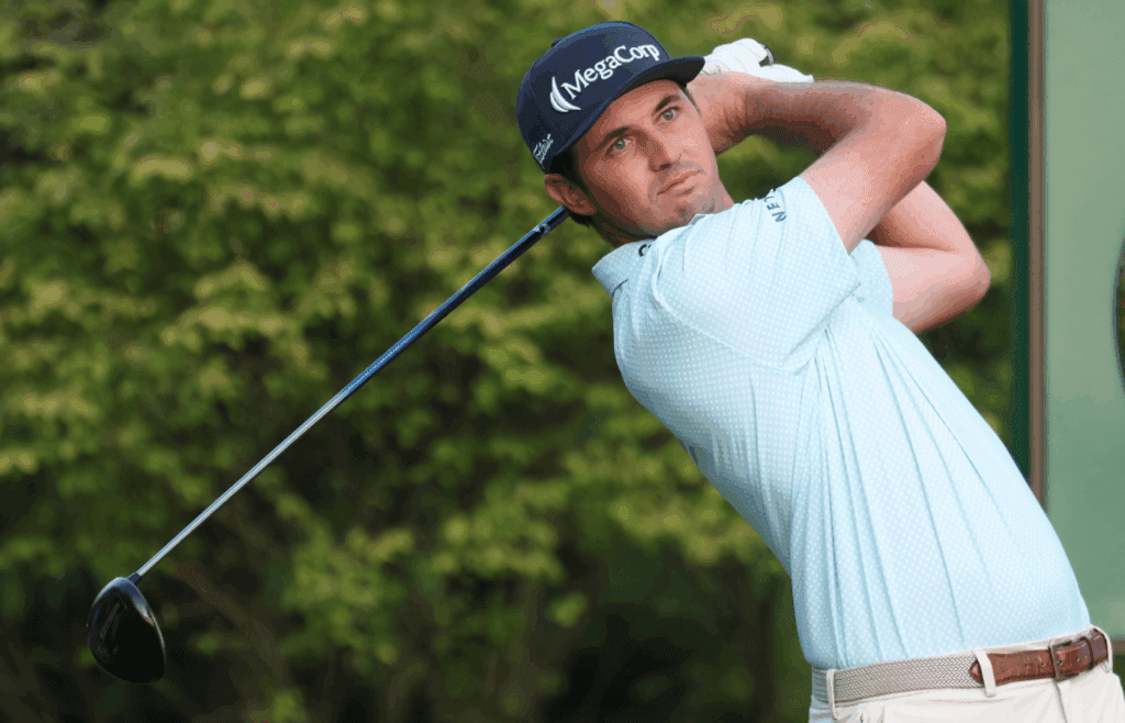 Jun 10, 2025; Oakmont, Pennsylvania, USA; J.T. Poston tees off on the first hole during a practice round for the U.S. Open golf tournament at Oakmont Country Club. Mandatory Credit: Charles LeClaire-Imagn Images
