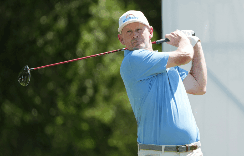 May 23, 2025; Fort Worth, Texas, USA; Brandt Snedeker plays his shot from the 12th tee during the second round of the Charles Schwab Challenge golf tournament. Mandatory Credit: Jim Cowsert-Imagn Images