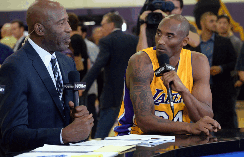 Sep 29, 2014; Los Angeles, CA, USA; Los Angeles Lakers guard Kobe Bryant (24) talks with James Worthy during media day at the team practice facility in El Segundo. Mandatory Credit: Jayne Kamin-Oncea-Imagn Images