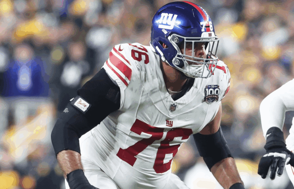 Oct 28, 2024; Pittsburgh, Pennsylvania, USA; New York Giants guard Jon Runyan (76) blocks at the line of scrimmage against the Pittsburgh Steelers during the second quarter at Acrisure Stadium. Mandatory Credit: Charles LeClaire-Imagn Images