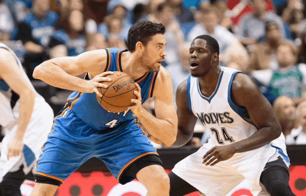 Apr 15, 2015; Minneapolis, MN, USA; Oklahoma City Thunder forward Nick Collison (4) holds the ball in the fourth quarter against the Minnesota Timberwolves forward Anthony Bennett (24) at Target Center. The Oklahoma City Thunder beats the Minnesota Timberwolves 138-113. Mandatory Credit: Brad Rempel-Imagn Images