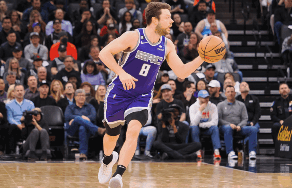 Mar 6, 2023; Sacramento, California, USA; Sacramento Kings point guard Matthew Dellavedova (8) brings the ball down the court against the New Orleans Pelicans during the second quarter at Golden 1 Center. Mandatory Credit: Kelley L Cox-Imagn Images