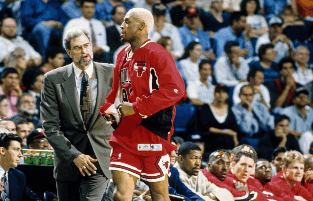 May 1, 1996; Miami, FL; USA; FILE PHOTO; Chicago Bulls head coach Phil Jackson and forward Dennis Rodman talk on the sidelines against the Miami Heat during the first round of the 1996 NBA Playoffs at the Miami Arena. Mandatory Credit: RVR Photos-Imagn Images