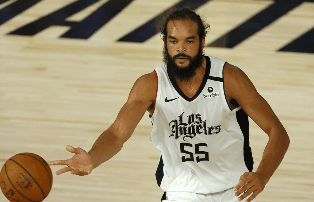 Aug 14, 2020; Lake Buena Vista, Florida, USA; Joakim Noah #55 of the LA Clippers dribbles the ball against the Oklahoma City Thunder during overtime at The Field House at ESPN Wide World of Sports Complex. Mandatory Credit: Mike Ehrmann/Pool Photo-Imagn Images
