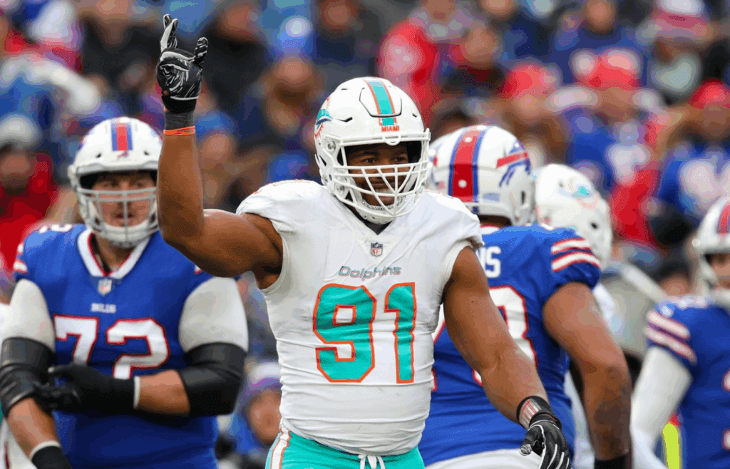 Dec 30, 2018; Orchard Park, NY, USA; Miami Dolphins defensive end Cameron Wake (91) reacts to a sack against the Buffalo Bills during the second quarter at New Era Field. Mandatory Credit: Rich Barnes-Imagn Images