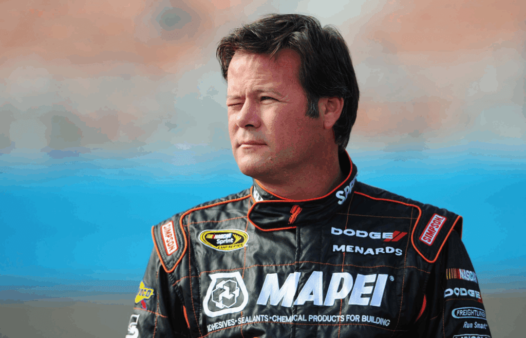 Nov. 12 2011; Avondale, AZ, USA; NASCAR Sprint Cup Series driver Robby Gordon (7) reacts on pit road during qualifying for the Kobalt Tool 500 at Phoenix International Raceway. Mandatory Credit: Jennifer Stewart-Imagn Images