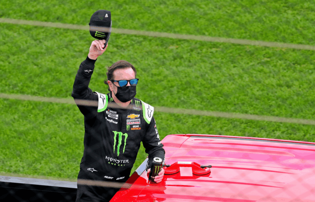 Feb 14, 2021; Daytona Beach, Florida, USA; NASCAR Cup Series driver Kurt Busch (1) waves to fans during driver introductions before the Daytona 500 at Daytona International Speedway. Mandatory Credit: Mark J. Rebilas-Imagn Images