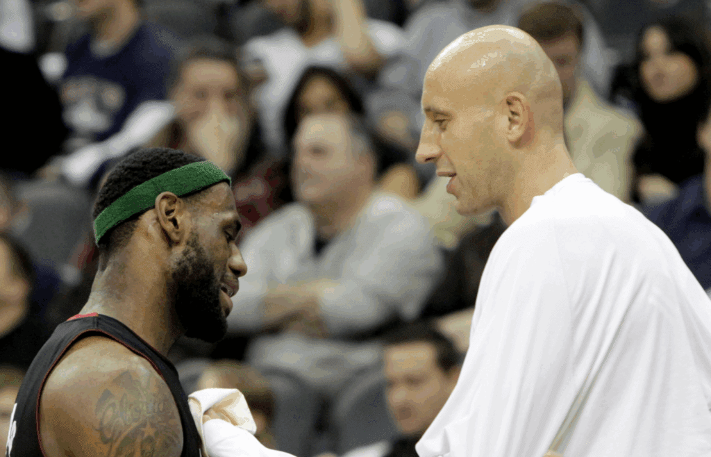 Apr 3, 2011; Newark, NJ, USA; Miami Heat forward LeBron James (6) talks with center Zydrunas Ilgauskas (11) during the first half against New Jersey Nets at the Prudential Center. Mandatory Credit: Nicole Sweet-Imagn Images