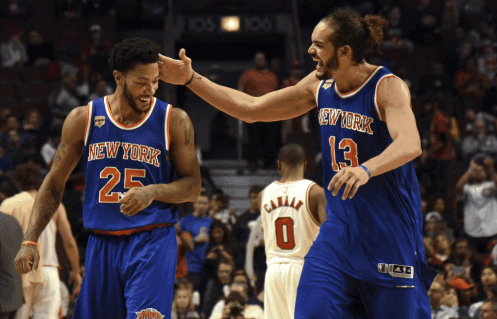 Nov 4, 2016; Chicago, IL, USA; New York Knicks center Joakim Noah (13) and New York Knicks guard Derrick Rose (25) celebrate during the second half at the United Center. The Knicks won 117-104. Mandatory Credit: David Banks-Imagn Images