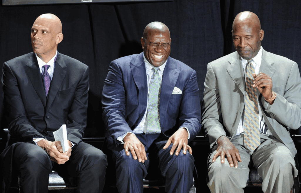 November 16, 2012; Los Angeles, CA, USA; NBA players Kareem Abdul-Jabbar, Irvin "Magic" Johnson and James Worthy on stage during the ceremony unveiling the Kareem Abdul-Jabbar statue in front of the Staples Center. Mandatory Credit: Jayne Kamin-Oncea-Imagn Images