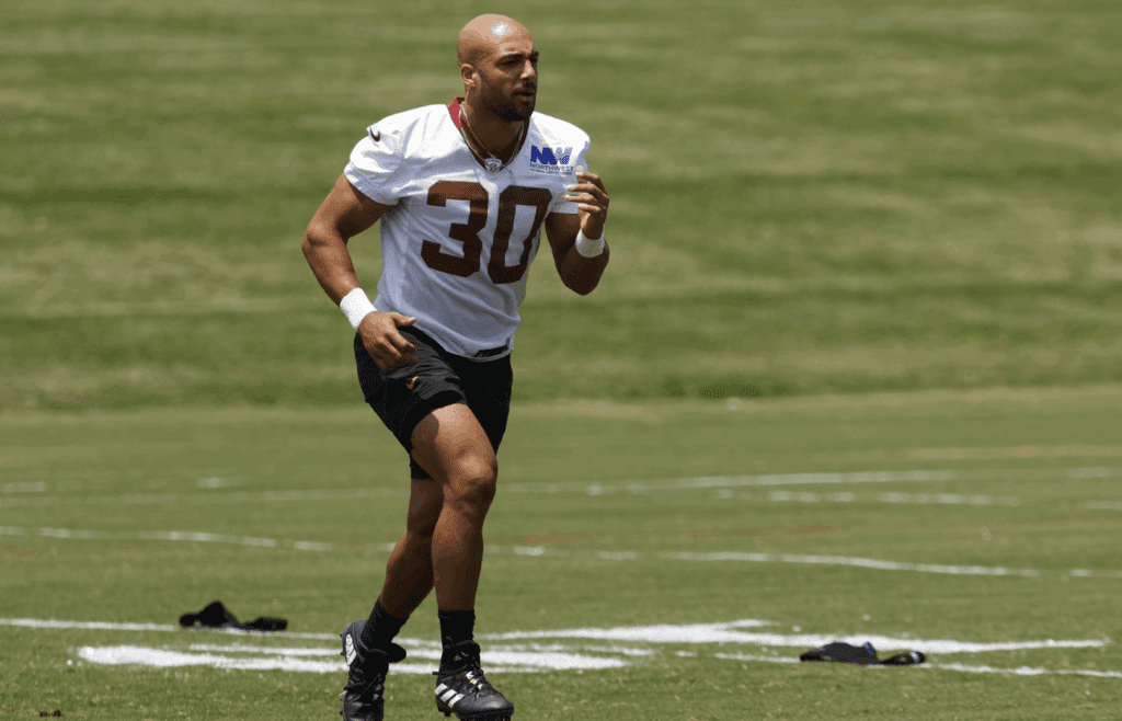 Jun 10, 2025; Ashburn, VA, USA; Washington Commanders running back Austin Ekeler (30) participates in a drill on day one of minicamp at Commanders Park. Mandatory Credit: Geoff Burke-Imagn Images