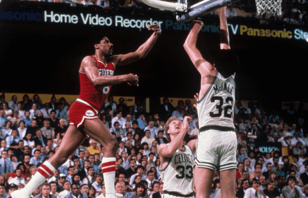 Unknown date; Boston, MA, USA; FILE PHOTO; Philadelphia 76ers forward Julius Erving (6) takes a shot against Boston Celtics forward Larry Bird (33) and Kevin McHale (32) at the Boston Garden. Mandatory Credit: Dick Raphael-Imagn Images