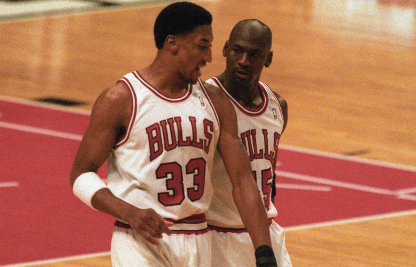Mar 30, 1995; Chicago, IL, USA; Chicago Bulls guard Michael Jordan (45) talks with forward Scottie Pippen (33) after a timeout from the game against the Boston Celtics at Chicago Stadium. The Bulls beat the Celtics 100-82. Mandatory Credit: Matthew Emmons-Imagn Images