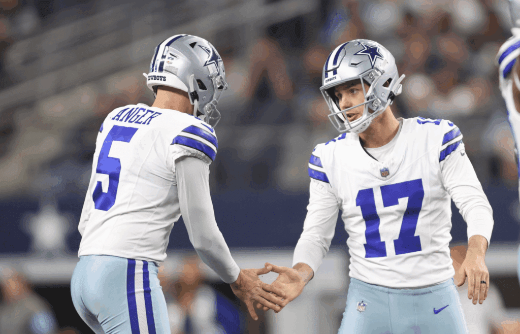 Dec 22, 2024; Arlington, Texas, USA; Dallas Cowboys place kicker Brandon Aubrey (17) is congratulated by safety Donovan Wilson (6) after making a field goal against the Tampa Bay Buccaneers in the second quarter at AT&T Stadium. Mandatory Credit: Tim Heitman-Imagn Images