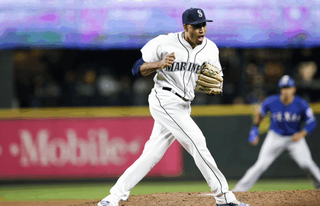 Sep 29, 2018; Seattle, WA, USA; Seattle Mariners relief pitcher Edwin Diaz (39) reacts after getting a strikeout for the final out of 4-1 victory against the Texas Rangers at Safeco Field. Diaz earned a save with the appearance, tying himself for second in the single-season record with 57. Mandatory Credit: Joe Nicholson-Imagn Images