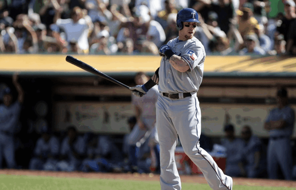 October 3, 2012; Oakland, CA, USA; Texas Rangers center fielder Josh Hamilton (32) reacts after striking out to end the sixth inning against the Oakland Athletics at O.co Coliseum. Mandatory Credit: Kelley L Cox-Imagn Images