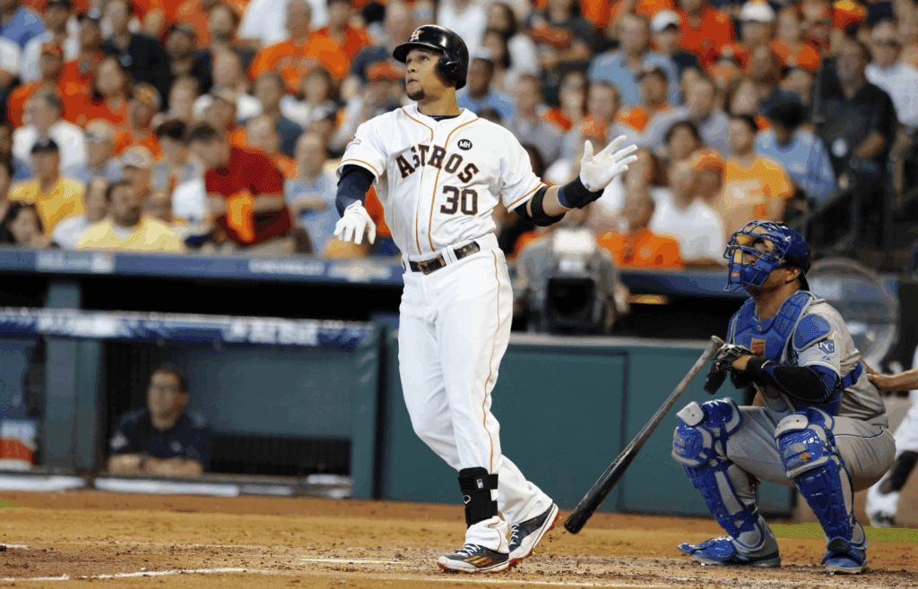Oct 12, 2015; Houston, TX, USA; Houston Astros center fielder Carlos Gomez (30) hits a solo home run against the Kansas City Royals during the second inning in game four of the ALDS at Minute Maid Park. Mandatory Credit: Thomas B. Shea-Imagn Images