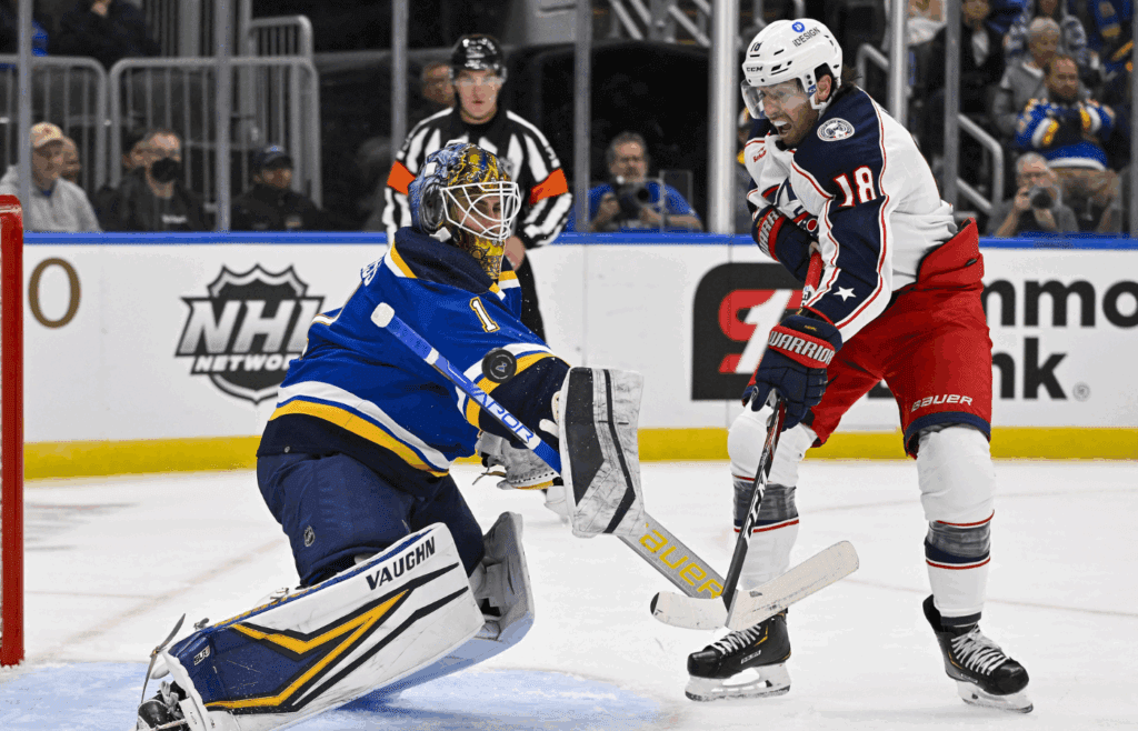 Sep 29, 2022; St. Louis, Missouri, USA; St. Louis Blues goaltender Thomas Greiss (1) makes a save against Columbus Blue Jackets forward James Neal (18) during the first period at Enterprise Center. Mandatory Credit: Jeff Curry-Imagn Images